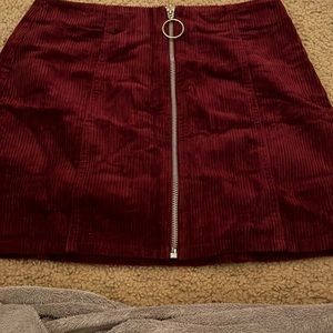 A maroon girls skirt